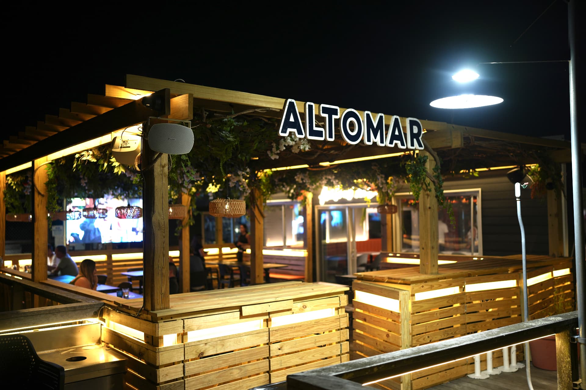 ALTOMAR waterfront dining at sunset